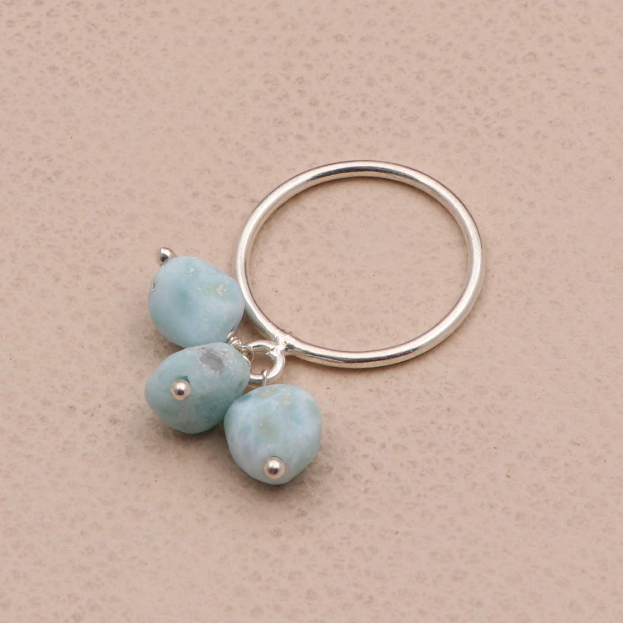 Wholesale rhodochrosite tumble stone rings dangling stone rings Supplier