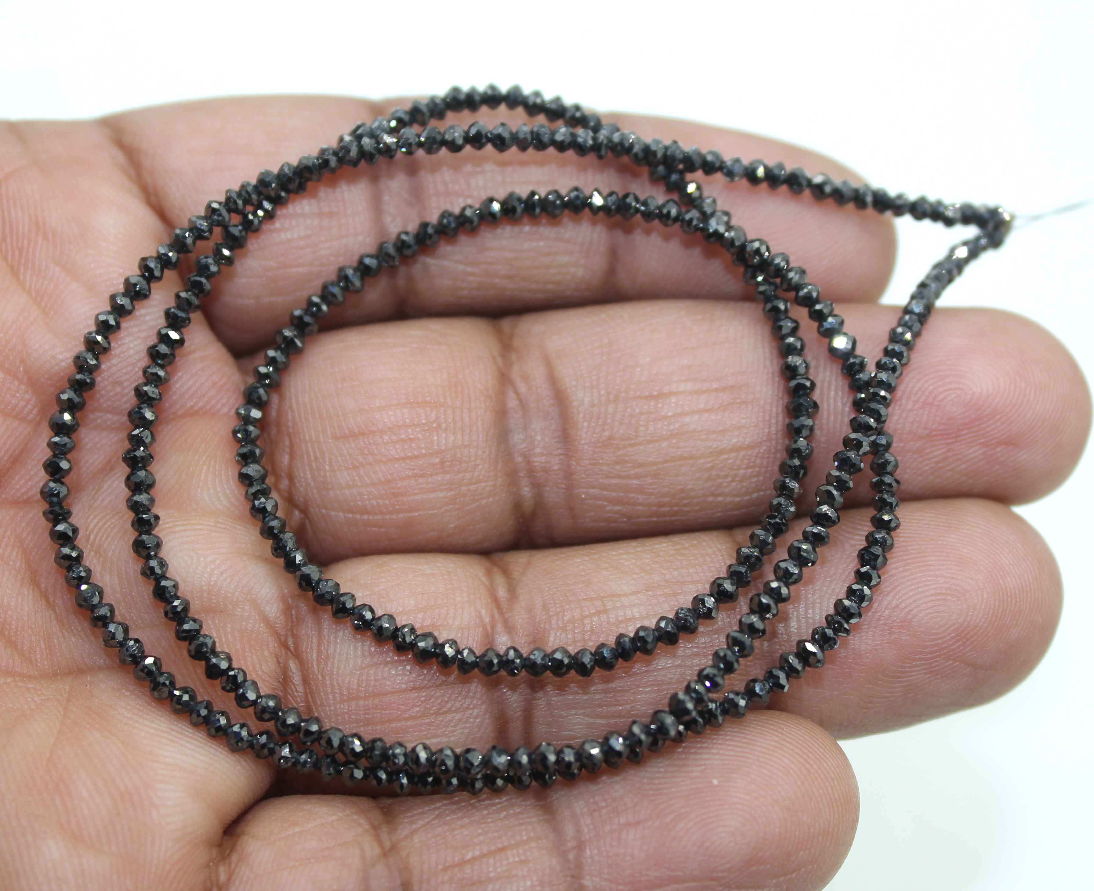 Wholesaler of diamond cut faceted beads natural black diamond beads