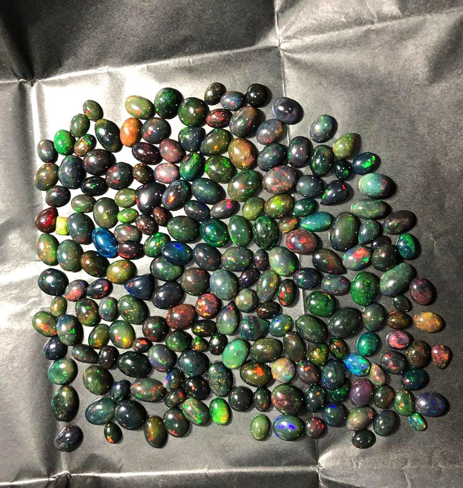 Wholesale fire smooth cabochons natural Ethiopian black opal gemstones