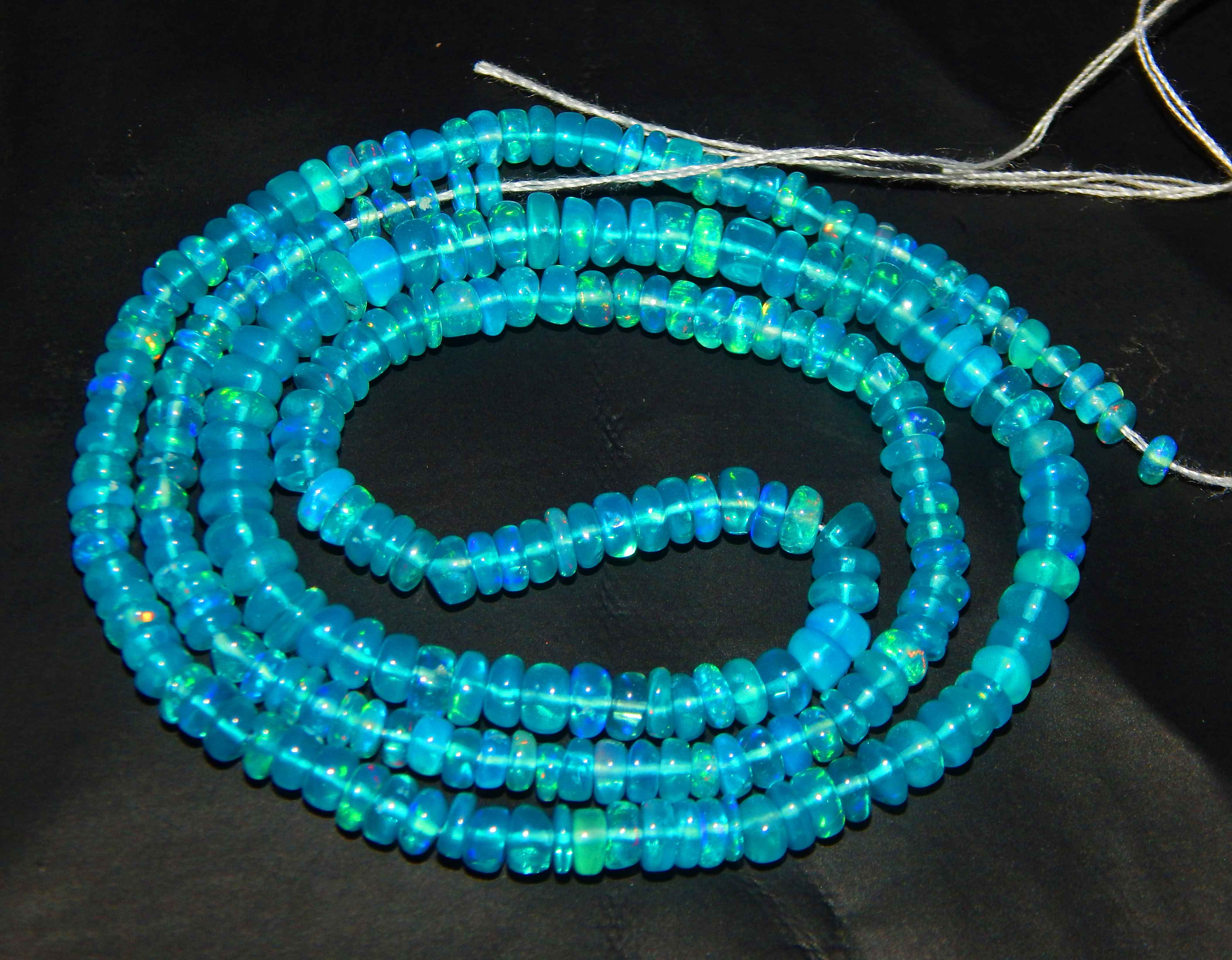 Wholesale natural color play and fire smooth Rondell beads Ethiopian blue opal