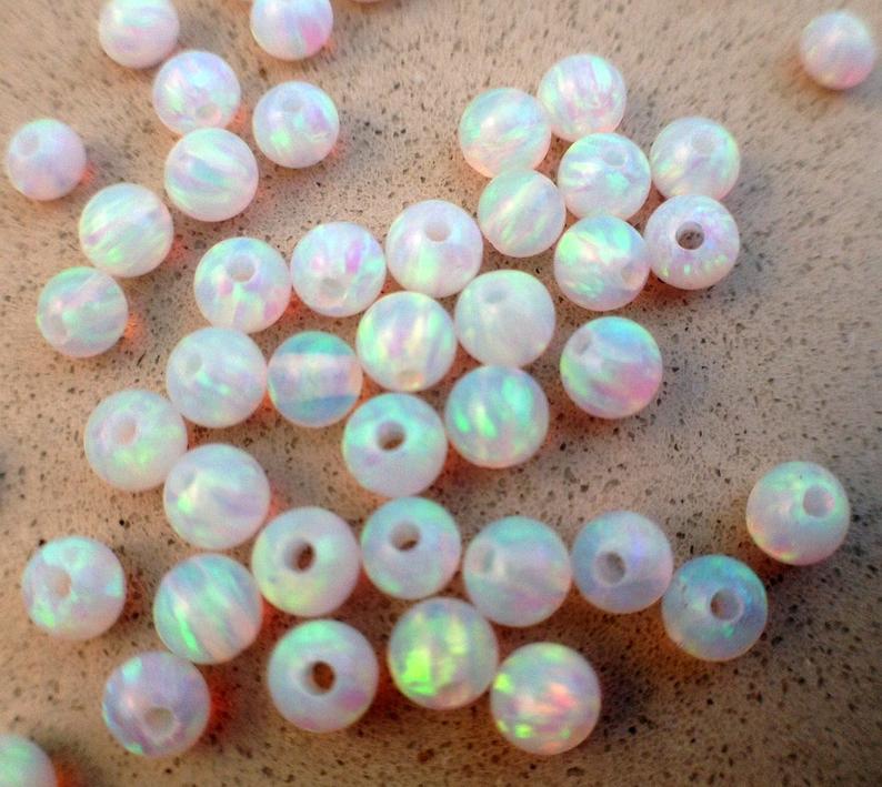 Ethiopian opal roundel cab large hole beads for sale Supplier