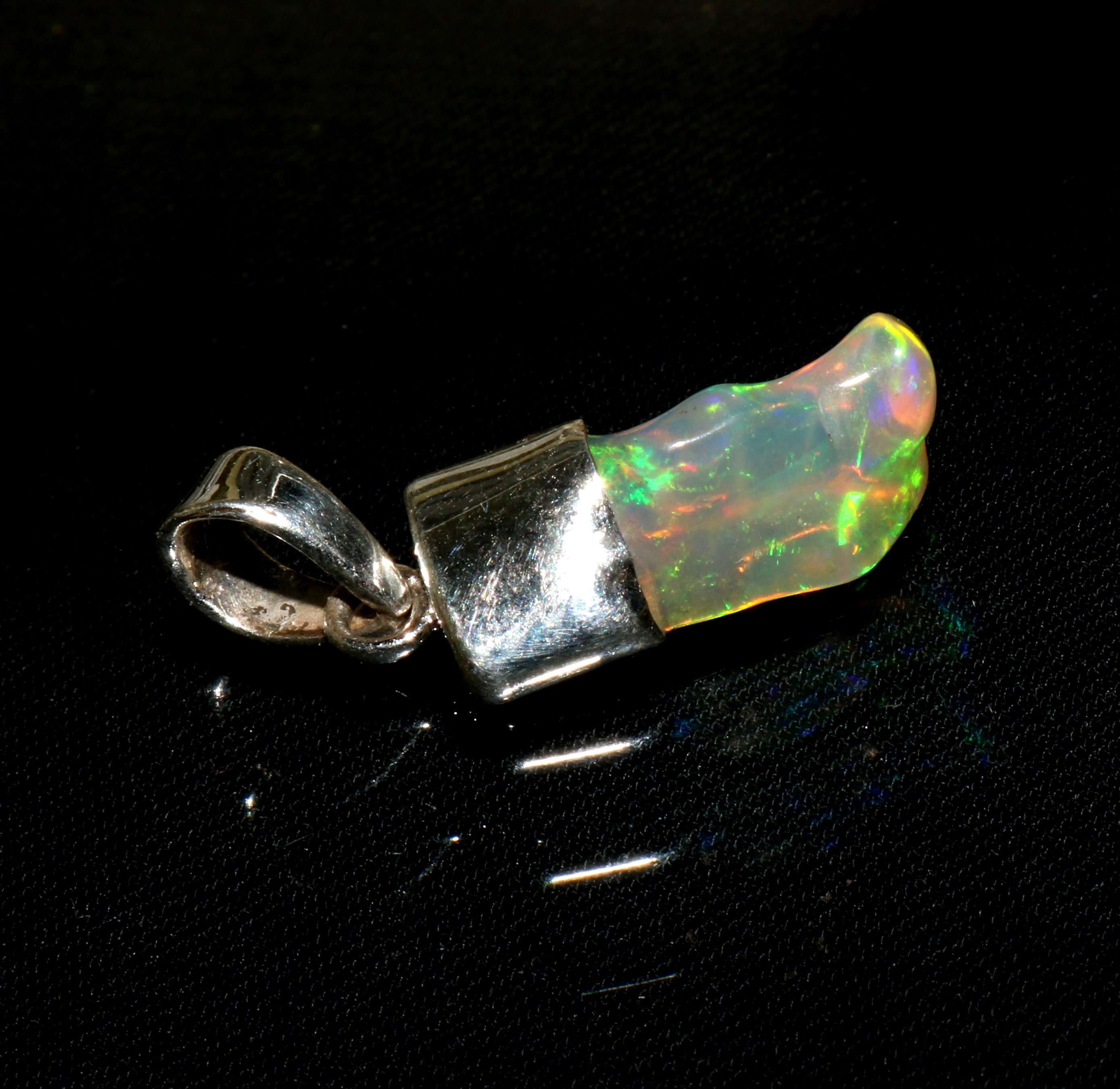 7.60 Carat Natural Ethiopian Opal Polish Rough Pendant  Exporter