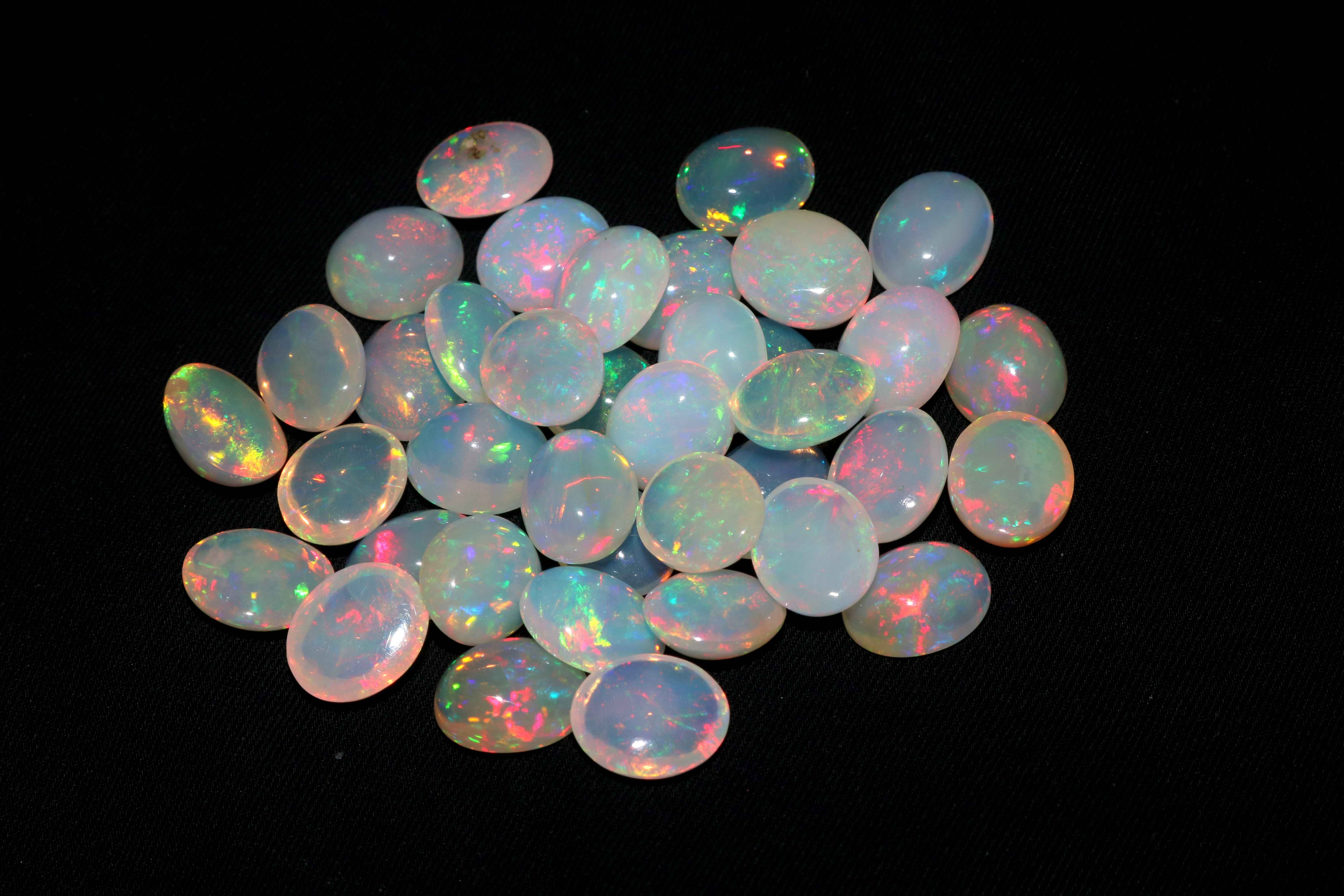 Top Quality Natural Ethiopian Opal Oval Shape 12x10 MM Loose Gemstone Exporter