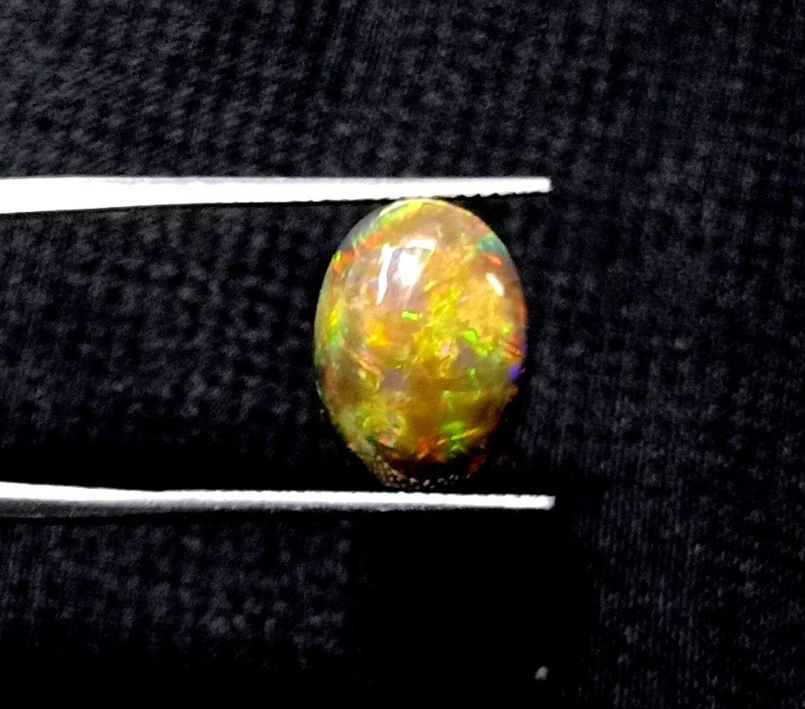 Ethiopian Opal Cabochons 14X10.5 Multi Fire Opal Cabochons Exporter