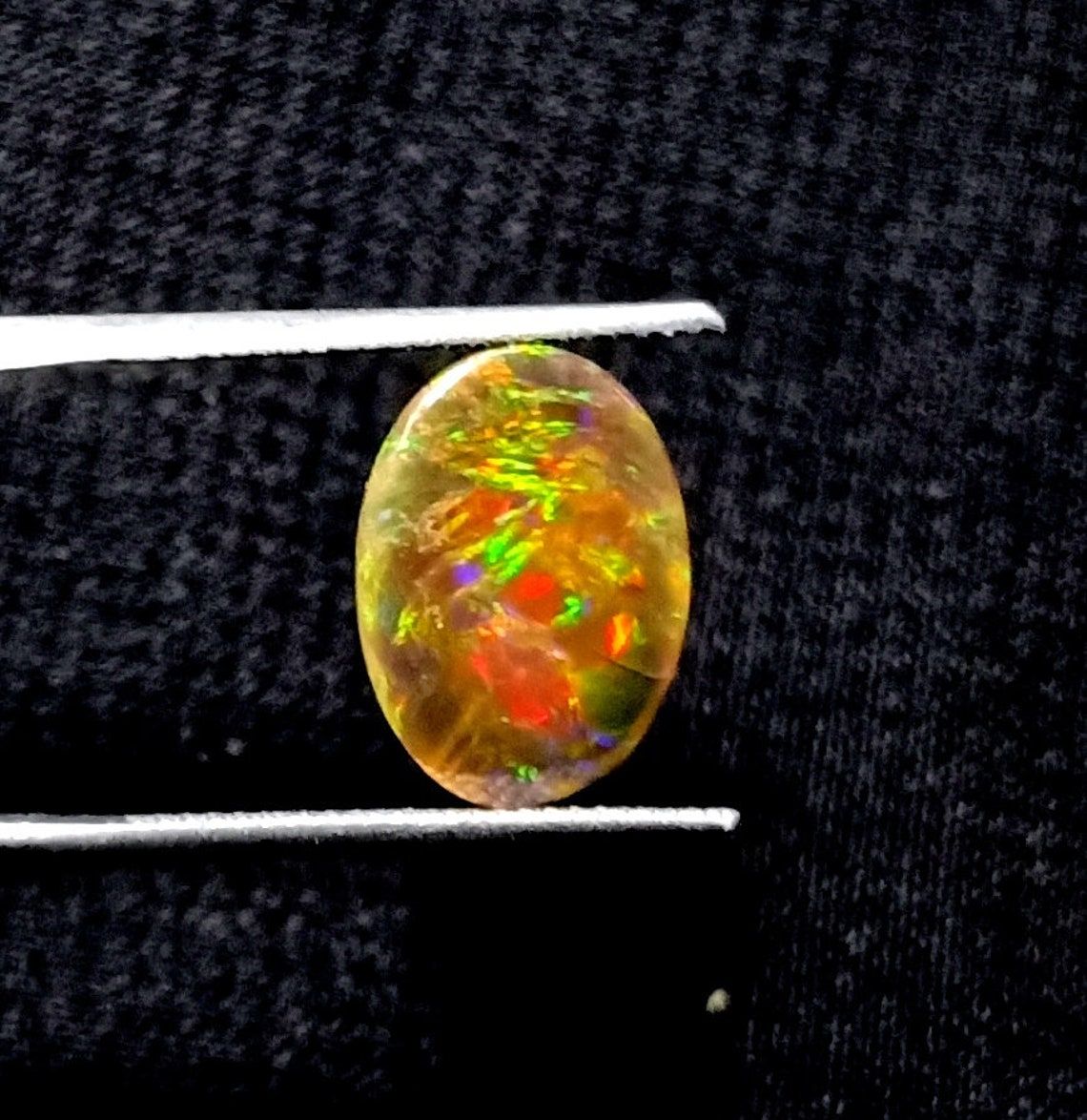 Ethiopian Opal Cabochons 14X10.5 Multi Fire Opal Cabochons Exporter