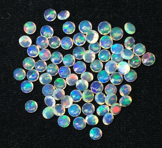 2mm Natural Fire Ethiopian Opal Round Faceted Loose Stone Exporter