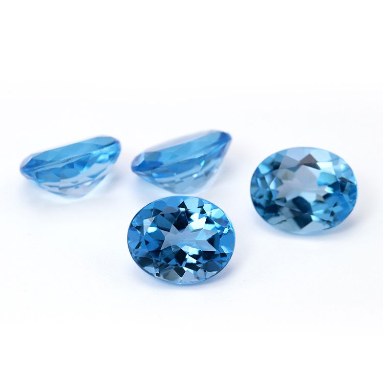 Natural swiss blue topaz price per carat oval shape loose gemstones Exporter